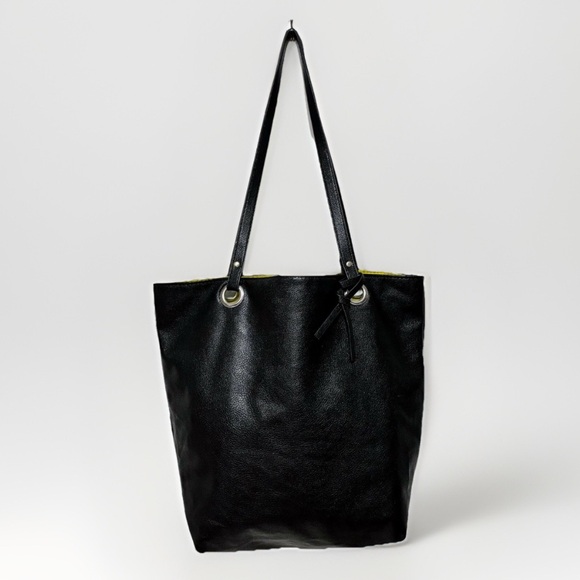 Beautiful black faux leather tote w/ a neon yellow interior lining - Picture 1 of 13
